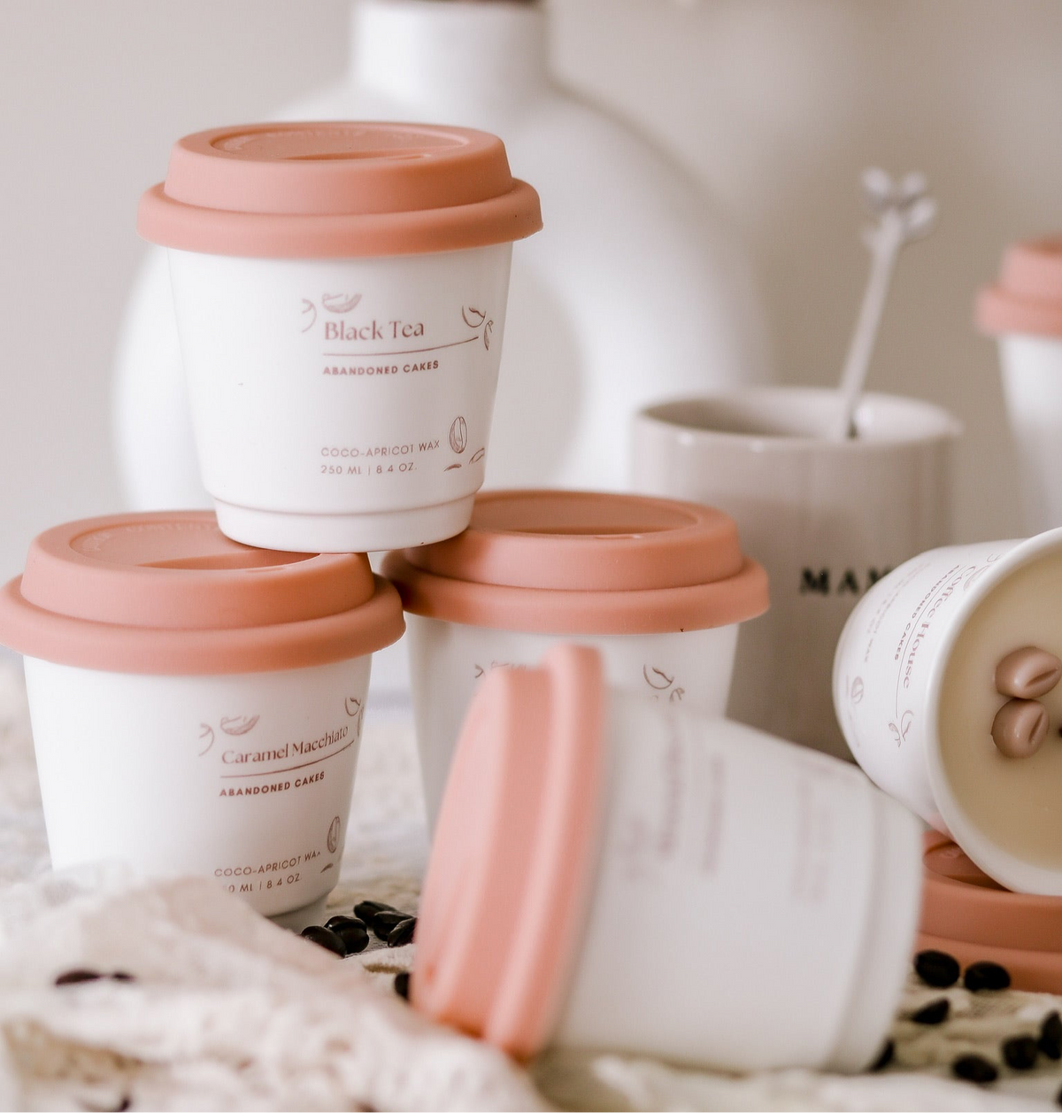 •	“Irish Cream Coffee Candle in ceramic to-go cup by Abandoned Cakes, with rich creamy coffee scent”
	•	“Hand-poured Irish coffee scented candle with vanilla and cream liquor notes”